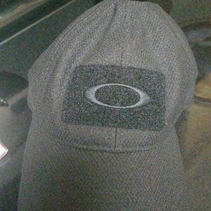 brand new black Oakley hat